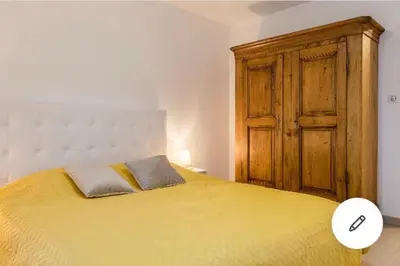 Un ou plusieurs lits dans un hébergement de l'établissement Appartement Colmar centre historique avec garage