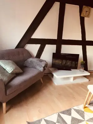 Coin salon dans l'établissement Le petit Colmarien hyper-centre
