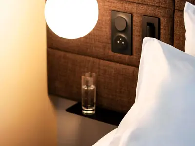 Un ou plusieurs lits dans un hébergement de l'établissement Novotel Belfort Centre Atria