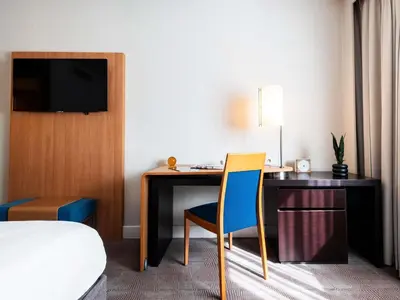 Un ou plusieurs lits dans un hébergement de l'établissement Novotel Belfort Centre Atria