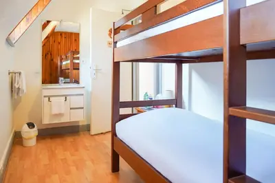 Un ou plusieurs lits dans un hébergement de l'établissement Chambres d'hôtes A la Fecht Nature et Bien-être