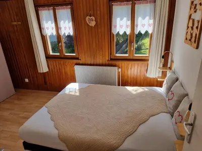 Un ou plusieurs lits dans un hébergement de l'établissement Chambres d'hôtes A la Fecht Nature et Bien-être