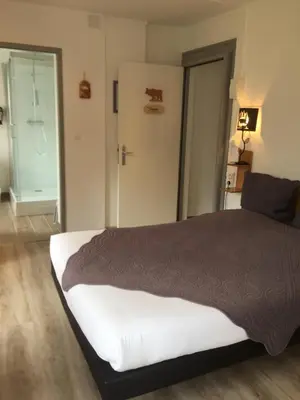 Un ou plusieurs lits dans un hébergement de l'établissement Chambres d'hôtes A la Fecht Nature et Bien-être