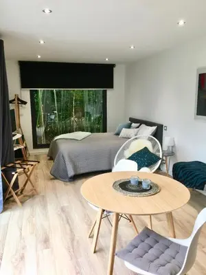Coin salon dans l'établissement Un petit nid dans la verdure