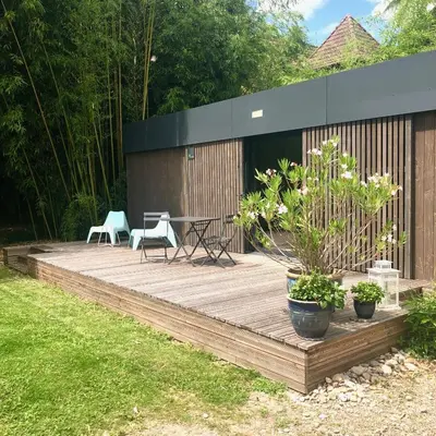 Jardin de l'établissement Un petit nid dans la verdure