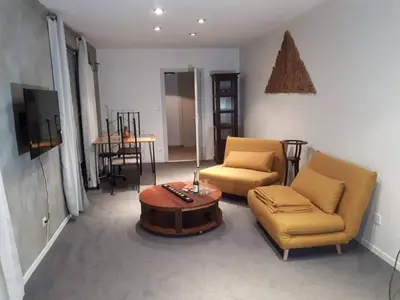 Coin salon dans l'établissement Naova Cosy Studio