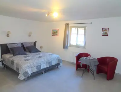 Un ou plusieurs lits dans un hébergement de l'établissement Maison d'Hôtes Le Cep d'Or Alsace