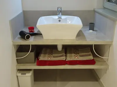 Salle de bains dans l'établissement Maison d'Hôtes Le Cep d'Or Alsace