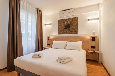 Un ou plusieurs lits dans un hébergement de l'établissement Residhotel Mulhouse Centre