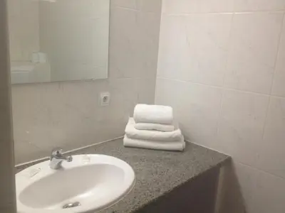 Salle de bains dans l'établissement Hotel Le Strasbourg
