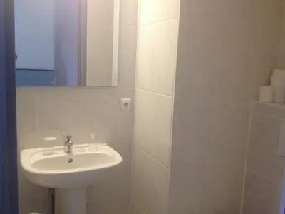 Salle de bains dans l'établissement Hotel Le Strasbourg
