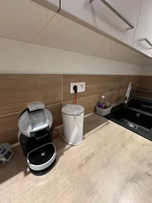 Cuisine ou kitchenette dans l'établissement Le 3 - Joli appartement T3 Mulhouse centre, Neuf, calme et tout équipé - stationnement gratuit