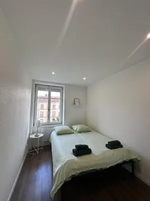 Un ou plusieurs lits dans un hébergement de l'établissement Le 3 - Joli appartement T3 Mulhouse centre, Neuf, calme et tout équipé - stationnement gratuit