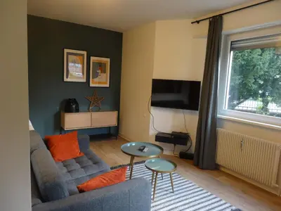 Télévision ou salle de divertissement dans l'établissement La vie est Belle