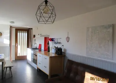 Cuisine ou kitchenette dans l'établissement Entre lac et pistes