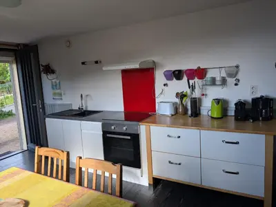 Cuisine ou kitchenette dans l'établissement Entre lac et pistes