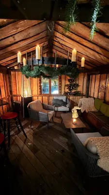 Coin salon dans l'établissement Hôtel Les Rives