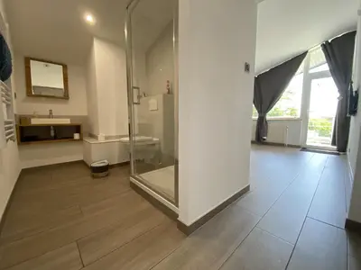 Salle de bains dans l'établissement Le Clos des Pommiers