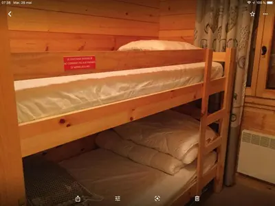 Un ou plusieurs lits dans un hébergement de l'établissement Chalet le val’tin