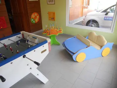 Salle de jeux dans l'établissement Auberge du Saut des Cuves