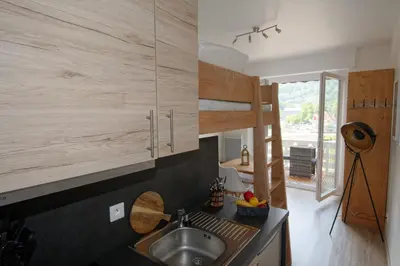 Cuisine ou kitchenette dans l'établissement Miellerie du lac