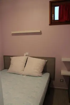 Un ou plusieurs lits dans un hébergement de l'établissement Apartement sur les hauteurs de Gerardmer avec une SUPERBE VUE