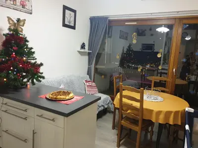 Coin salon dans l'établissement Apartement sur les hauteurs de Gerardmer avec une SUPERBE VUE