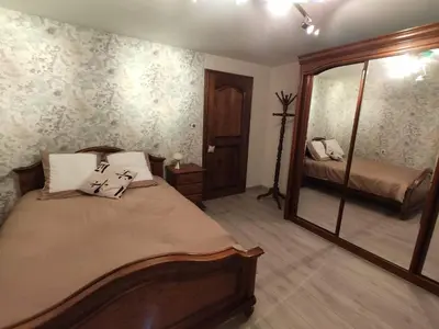 Un ou plusieurs lits dans un hébergement de l'établissement Chambre d’hotes chez Sylviane
