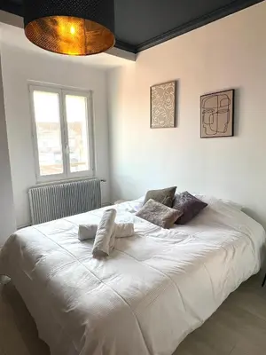 Un ou plusieurs lits dans un hébergement de l'établissement The beautiful cosy apartment