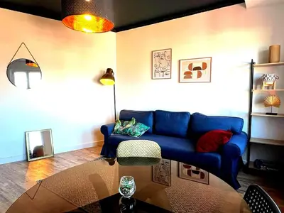 Coin salon dans l'établissement The beautiful cosy apartment