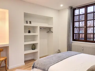 Un ou plusieurs lits dans un hébergement de l'établissement LOVELY COLMAR