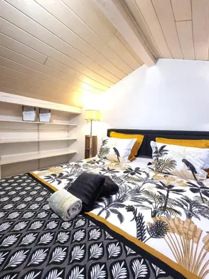 Un ou plusieurs lits dans un hébergement de l'établissement MAISON COSY 7 minutes des frontières