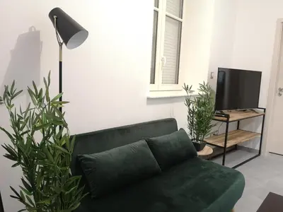 Télévision ou salle de divertissement dans l'établissement LE WILSON SUITE - Centre-ville - Gare - Tram