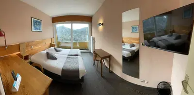 Un ou plusieurs lits dans un hébergement de l'établissement Hostel de La Grande Cascade
