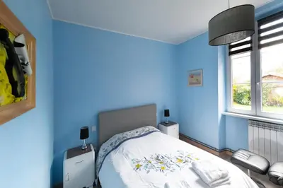 Un ou plusieurs lits dans un hébergement de l'établissement Gîte d’Anna