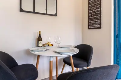 Coin salon dans l'établissement Le 21 -GregIMMO-Appart'Hôtel