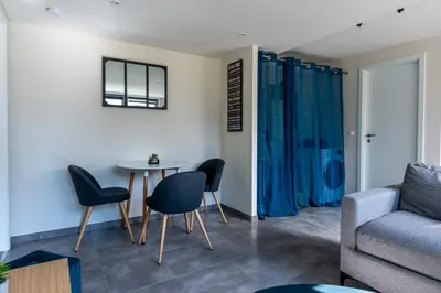 Coin salon dans l'établissement Le 21 -GregIMMO-Appart'Hôtel