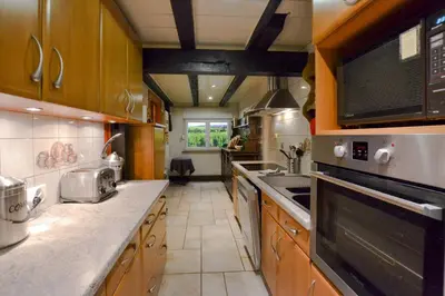 Cuisine ou kitchenette dans l'établissement Gite oncle Yerry