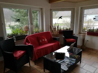 Coin salon dans l'établissement GITE LES ECUREUILS
