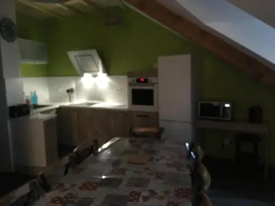 Cuisine ou kitchenette dans l'établissement LE REFUGE DU VIEUX MOULIN