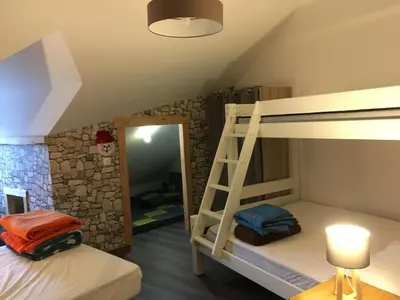 Un ou plusieurs lits dans un hébergement de l'établissement LE REFUGE DU VIEUX MOULIN