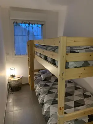 Un ou plusieurs lits dans un hébergement de l'établissement Les balcons de la haie griselle