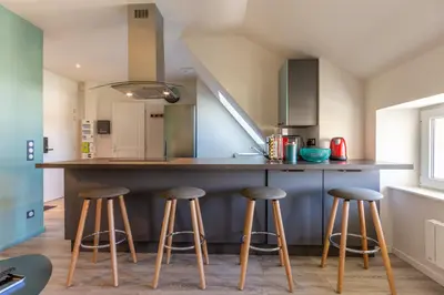 Cuisine ou kitchenette dans l'établissement Le 201-GregIMMO-Appart'Hôtel
