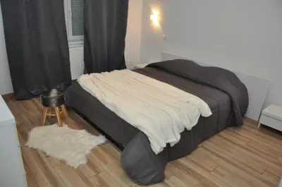 Un ou plusieurs lits dans un hébergement de l'établissement La Villa Vauban