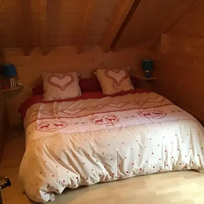 Un ou plusieurs lits dans un hébergement de l'établissement Chalet le Grizzly