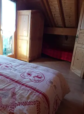 Un ou plusieurs lits dans un hébergement de l'établissement Chalet le Grizzly