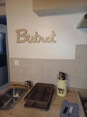 Cuisine ou kitchenette dans l'établissement LE GITE