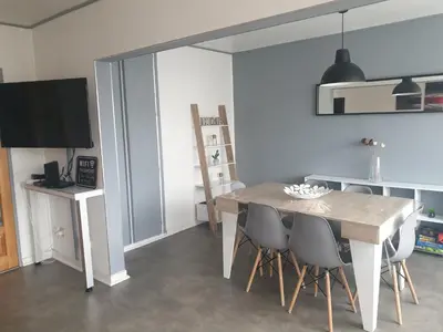 Télévision ou salle de divertissement dans l'établissement Mulhouse,Grand appart cosy&lumineux, 78m2 , pour 5 personnes