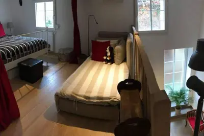 Un ou plusieurs lits dans un hébergement de l'établissement Esprit Loft