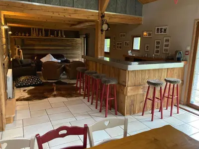 Coin salon dans l'établissement La Ferme du Douanier & Spa 5 étoiles ALL INCLUSIVE